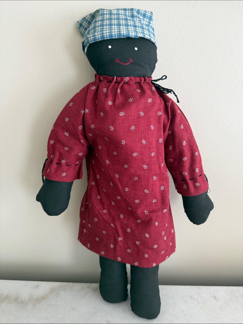 Vintage black cloth folk art rag doll named Samantha
